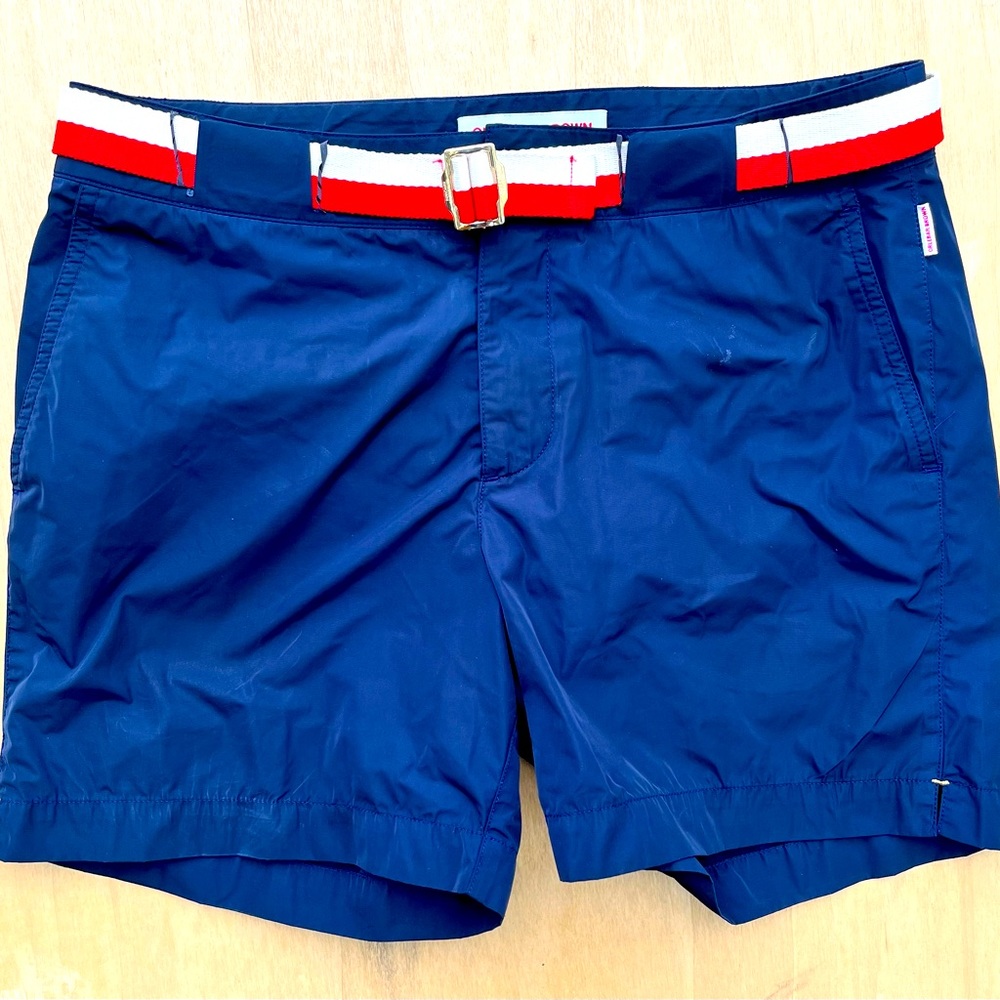 Navy belted swim trunks